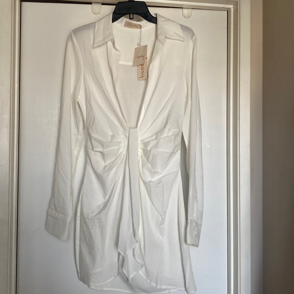 New with tags, white dress with very low deep front